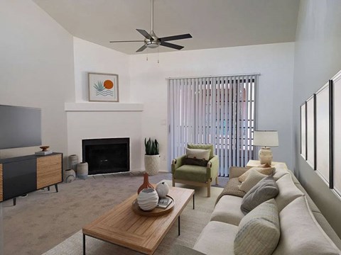 A living room with a fireplace, a couch, a chair, a coffee table, and a painting on the wall.