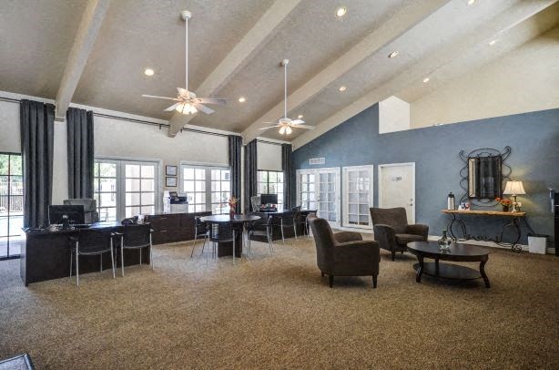 a large room with chairs and tables in it