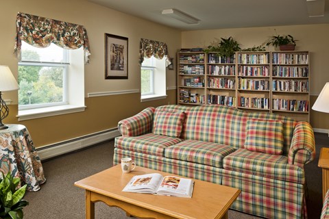 a living room with a couch and a coffee table