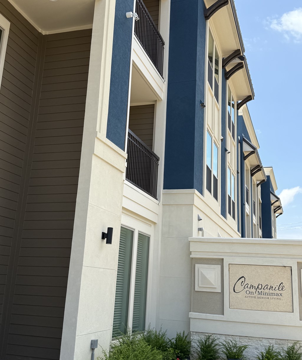 A building with a sign that says "Campanile" on it.