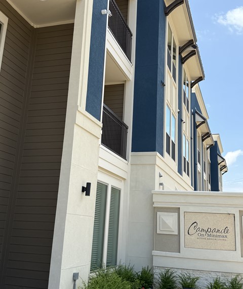 A building with a sign that says "Campanile" on it.