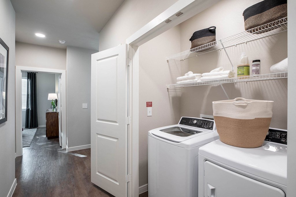 our apartments offer a laundry room with washer and dryer at 55 Fifty at Northwest Crossing, Houston, TX