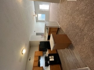 a view of the living room from the loft of a house