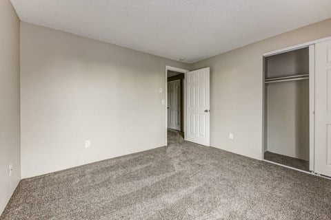 our apartments offer a living room with carpet and a door to the hallway