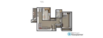 A floor plan of a house with a kitchen, living room, and two bedrooms.