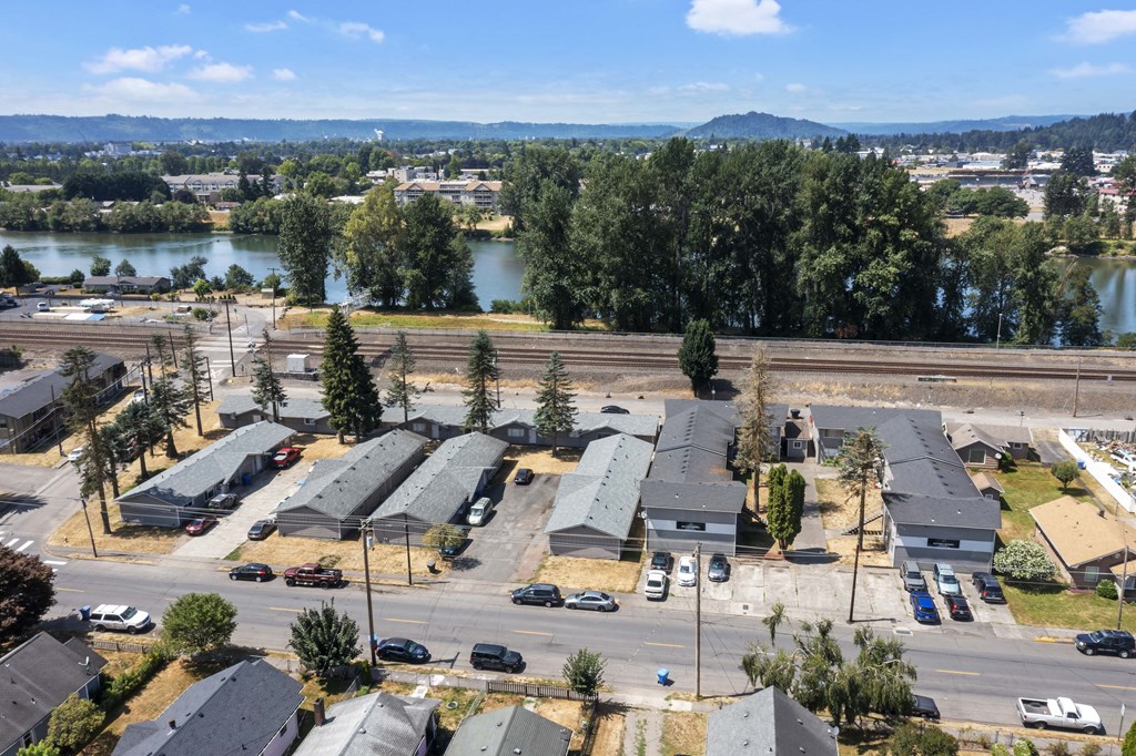 arial view of a subdivision with a river in the background
