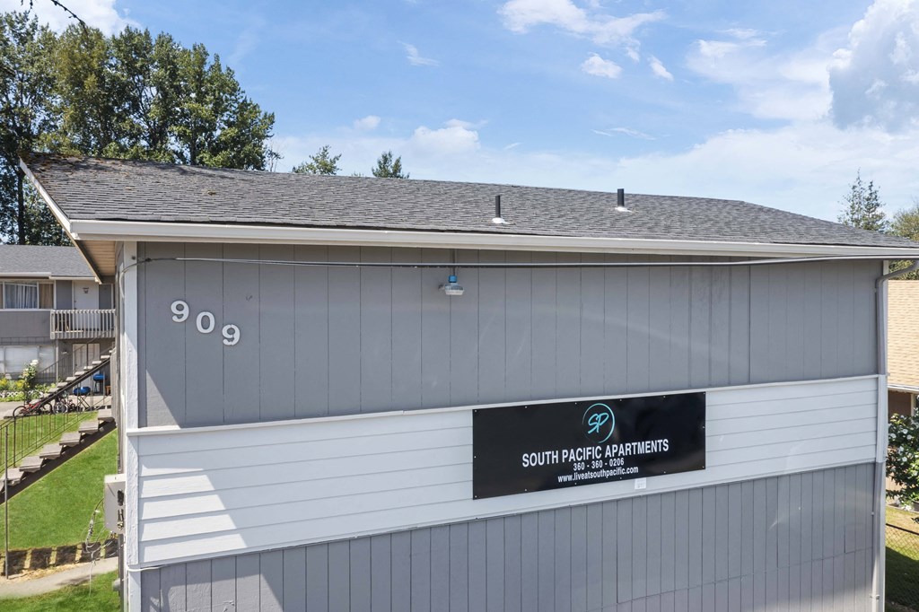 a gray building with a gray roof