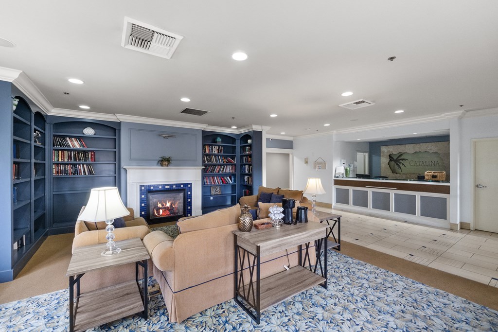 a living room with a couch and a fireplace