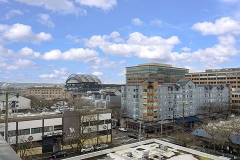 A cityscape with buildings and a clear sky.