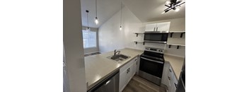 Modern kitchen with white cabinets