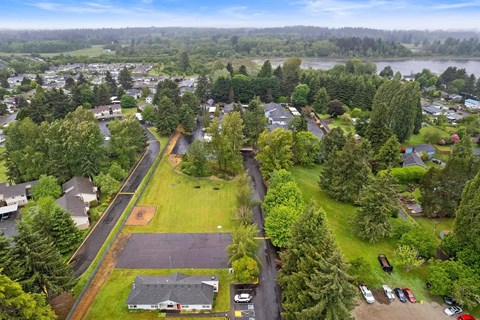 A small town with a baseball field in the middle.