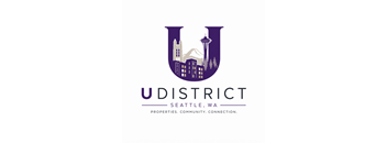 A logo for U District Seattle, Washington, featuring a stylized letter U with a city skyline and a mountain in the background.