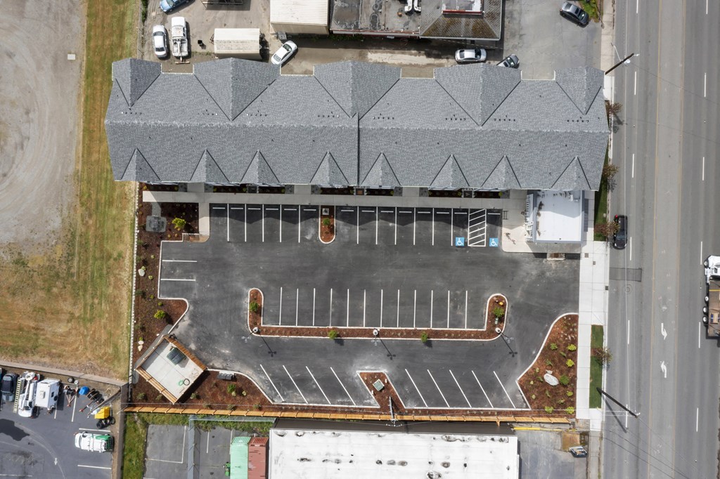 an aerial view of a parking lot in a city