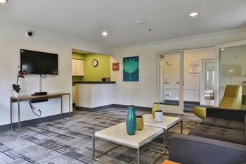 a living room with a couch and a table