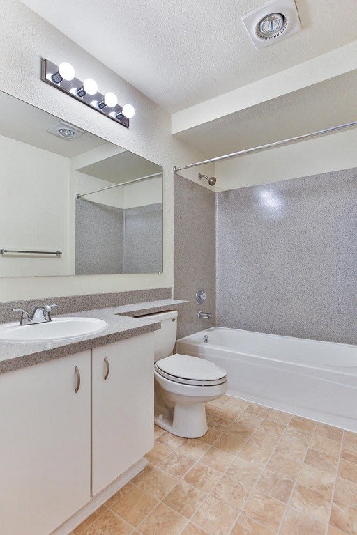 a bathroom with a sink toilet and a bath tub