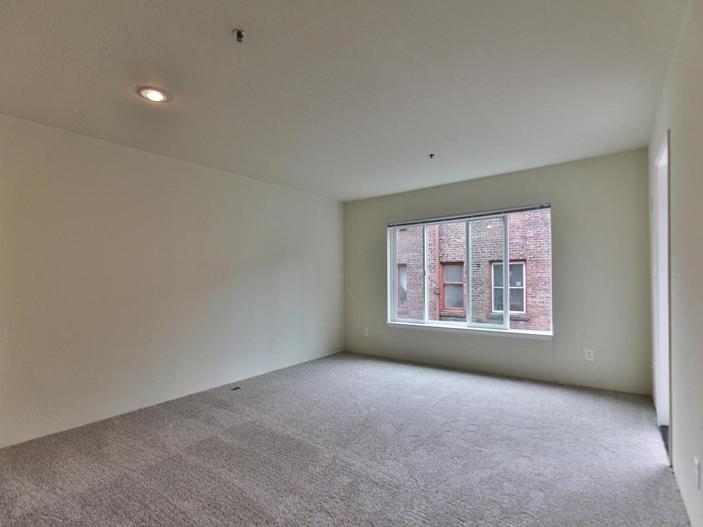 an empty room with a window in it