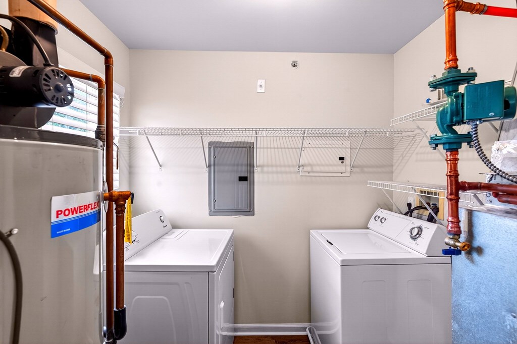A laundry room with a washer and dryer.