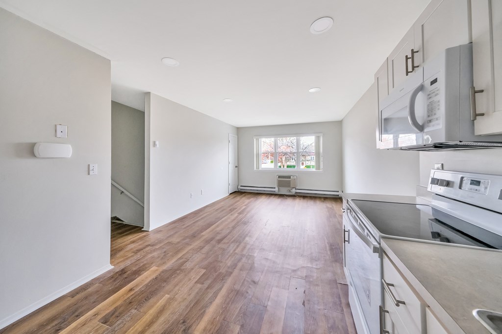 Living room view from kitchen at Amity Senior, New York, 11701
