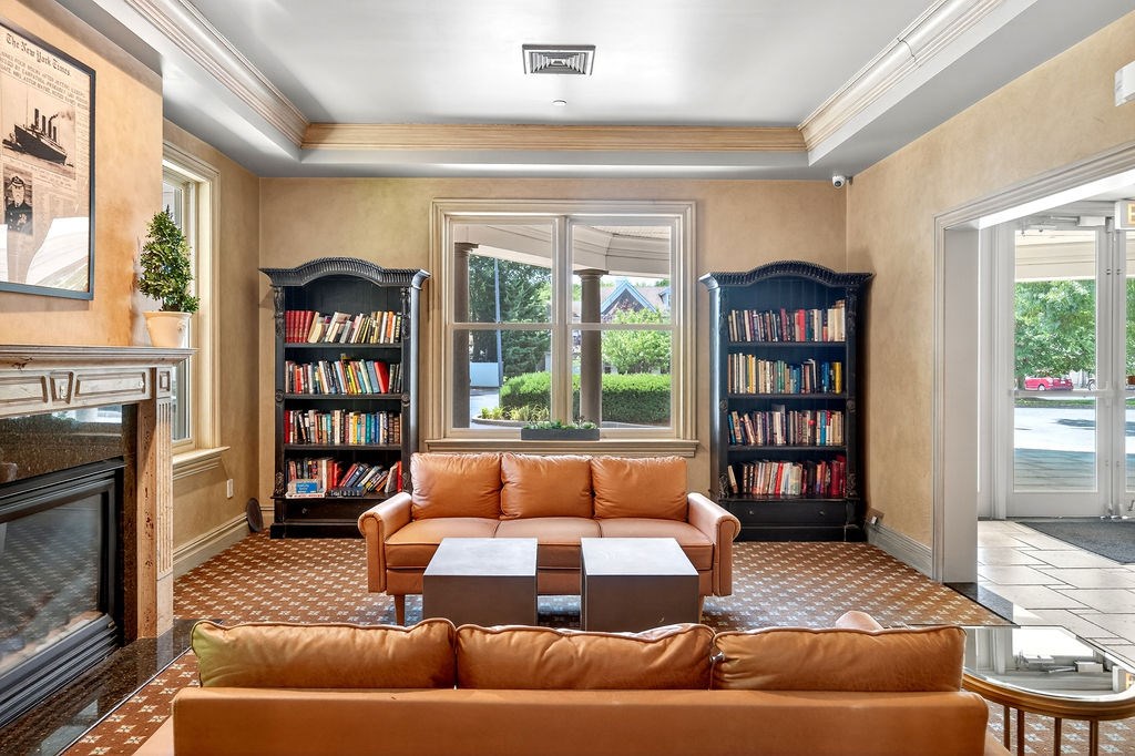 A living room with a fireplace and a couch.