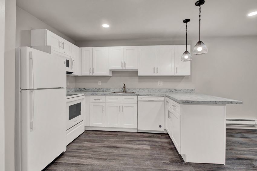 Kitchen lights and appliances with cabinets Kitchen lights and appliances with cabinets at Oakwood Manor, New York, 11706