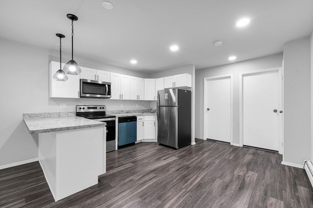 Kitchen with appliancesat Amity Oak, New York