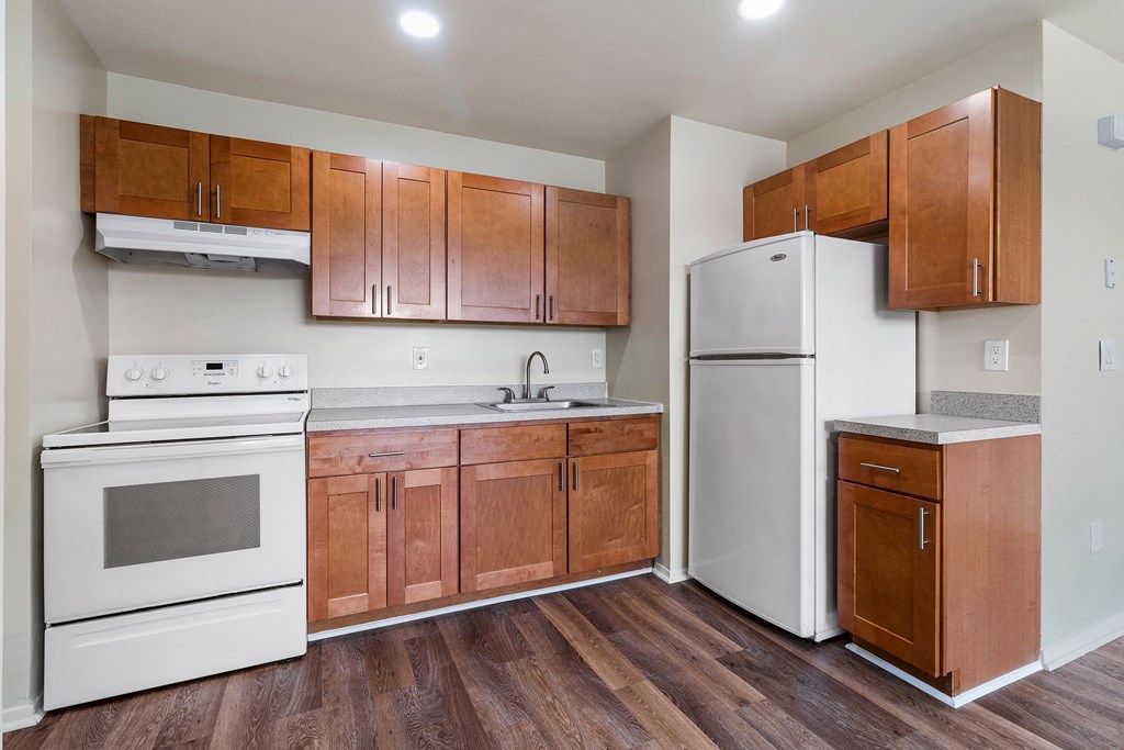 Wooden cabinets in kitchen at Oakwood Manor, Bay Shore