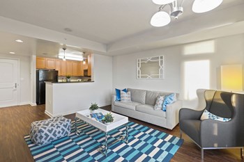 Living Room With Kitchen Area Living Room With Kitchen Area at Wentworth Apartment Homes, North Bethesda, MD - Photo Gallery 5