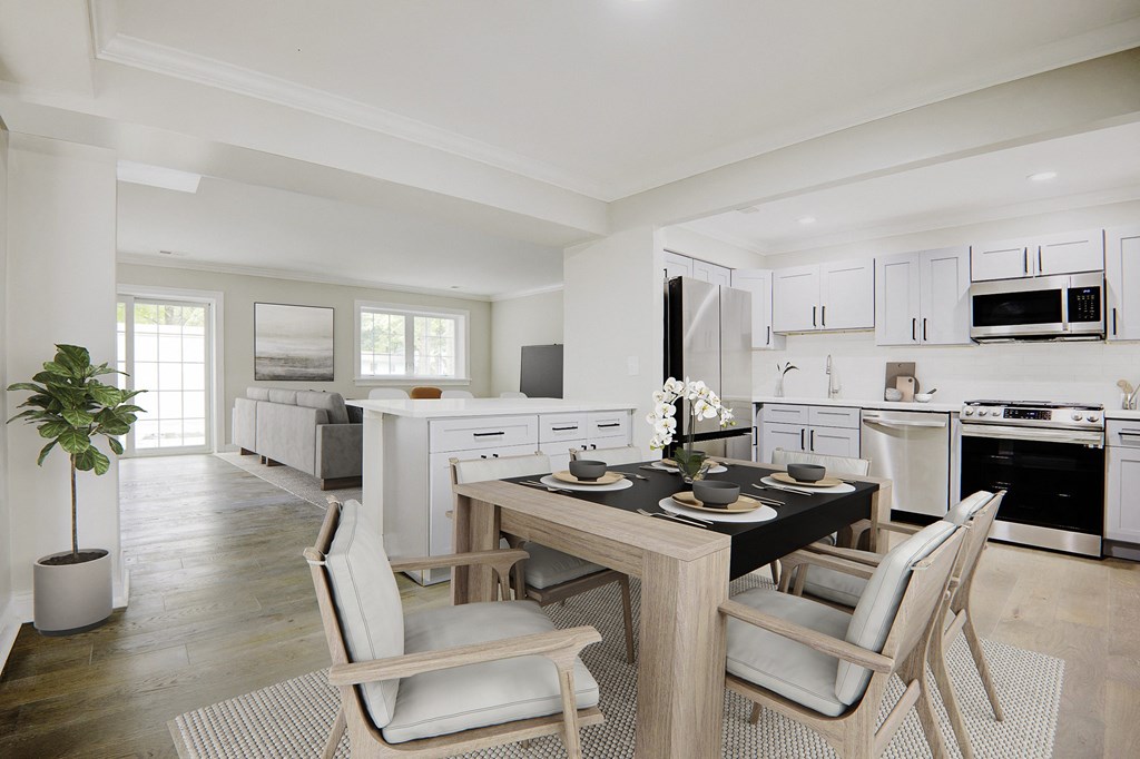 Newly renovated apartment home with open concept floor plan, new cabinets, new quartz countertops, stainless steel appliances, new flooring, paint