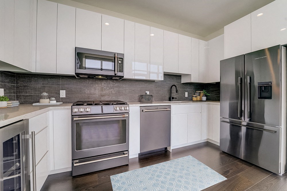 penthouse kitchen with stainless steel appliances at Continuum, New York, 10606