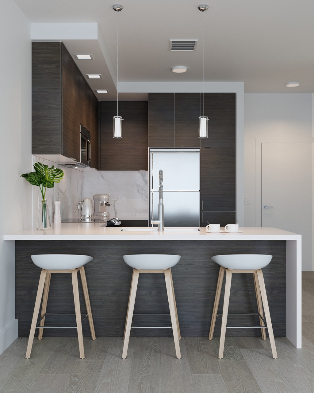 kitchen with Dark Finishes featuring Island with Waterfall Edge, Stainless Steel Whirlpool Appliances at Arrowwood Apartments, North Bethesda, MD, 20852