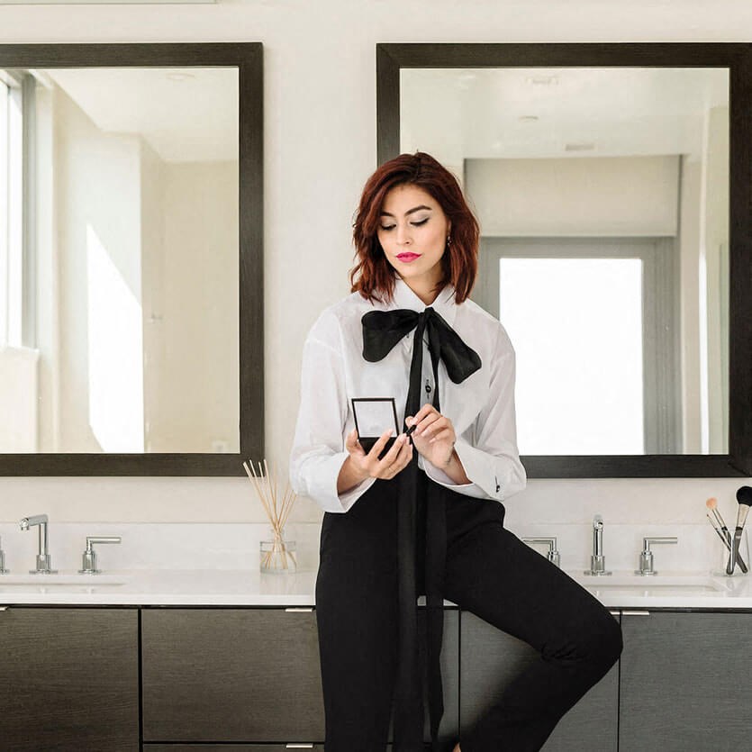 Lady in chic bathroom at Altaire, Arlington, VA