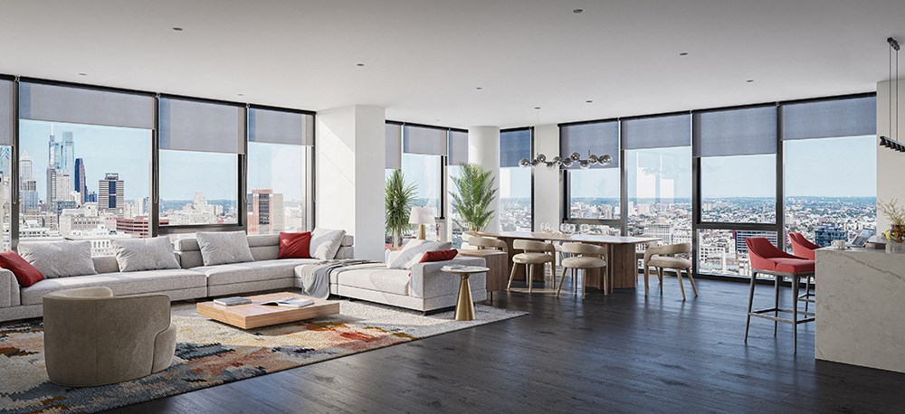A daytime rendering of a Penthouse living room with a view of the Philadelphia skyline