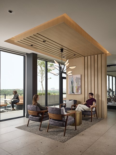 a room filled with furniture and a large window