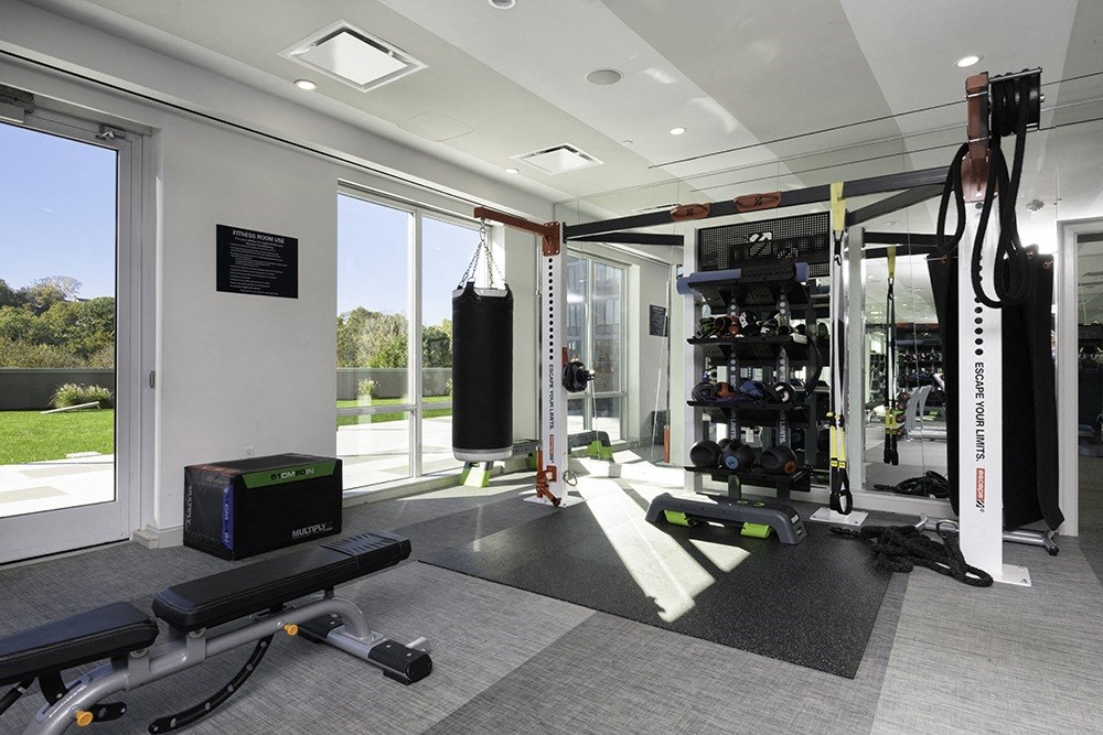 Living room with white interior at Continuum, White Plains, NY