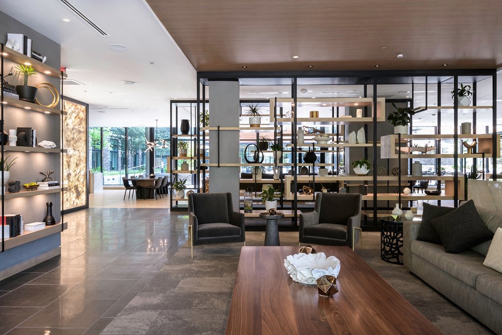 Resident clubhouse with work areas and ample seating at Arrowwood Apartments, North Bethesda
