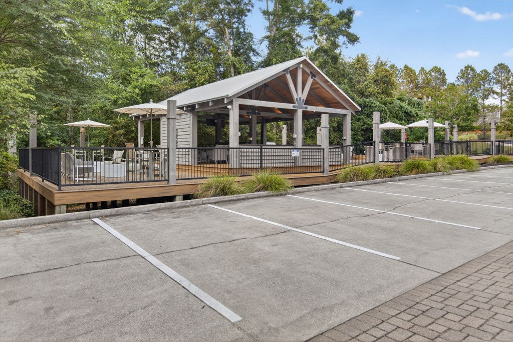 A pavement with a building in the background.