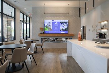 Clubhouse with TV at The Azul Apartment Homes in Oxford, 38655