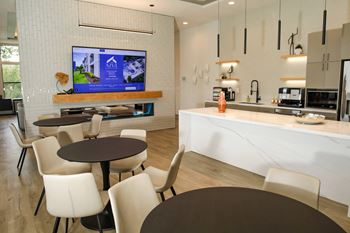 Clubhouse with coffee bar at The Azul Apartment Homes in Oxford, MS