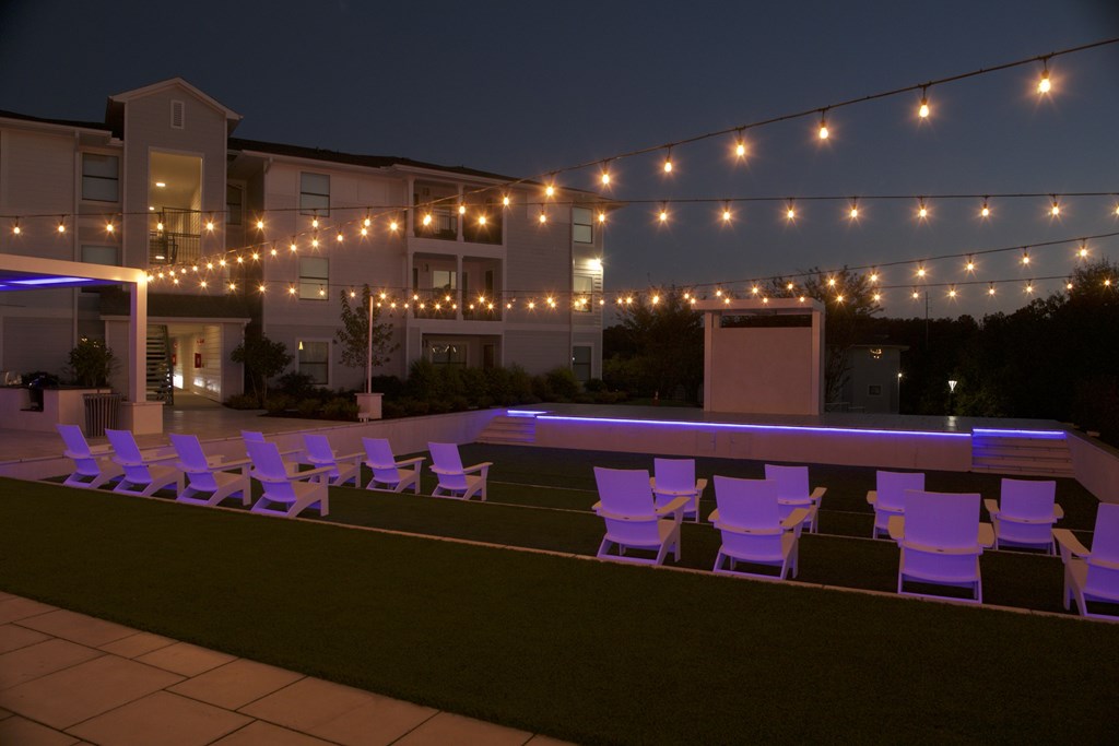 A string of lights is strung across a patio. at The Azul Apartment Homes, Oxford, MS