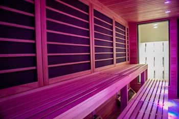 A sauna with wooden benches at The Azul Apartment Homes in Oxford, MS 38655