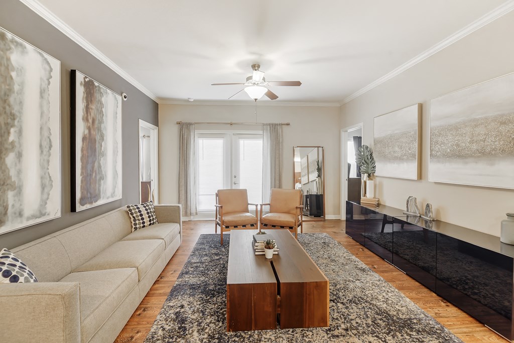 a living room with a couch and a coffee table at Cumberland Place Apartment Homes, Texas