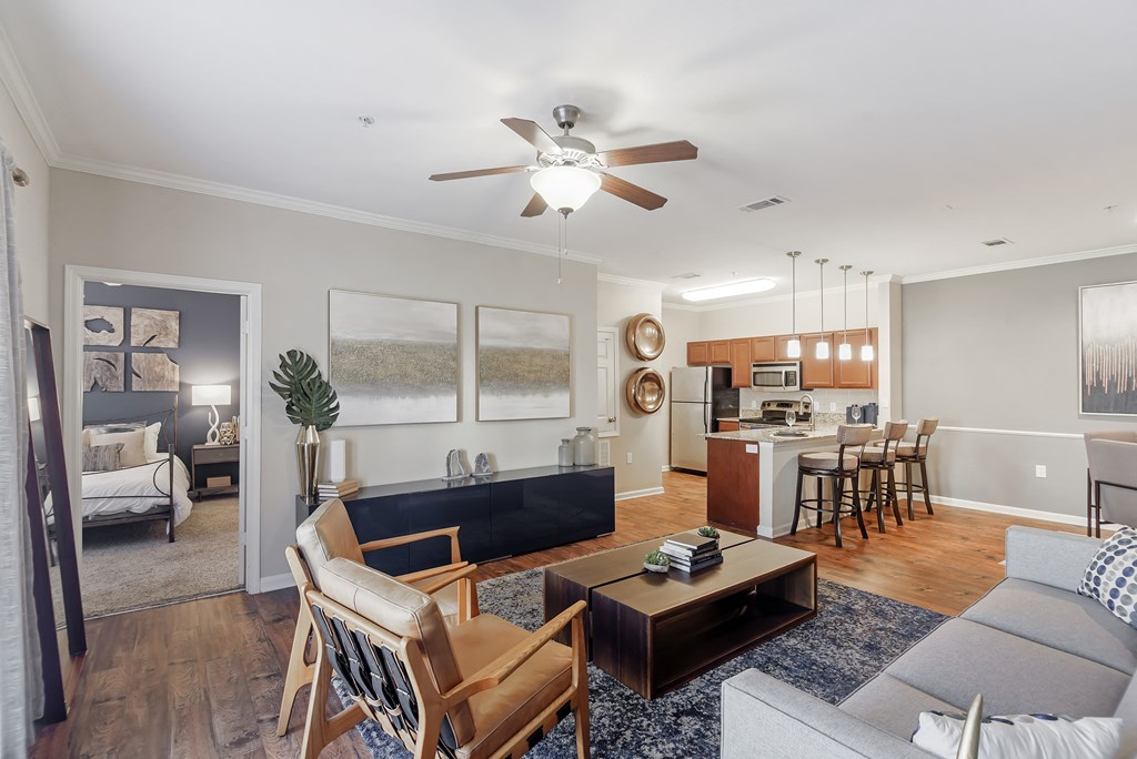 a living room with a couch and a table at Cumberland Place Apartment Homes, Tyler, TX 75703