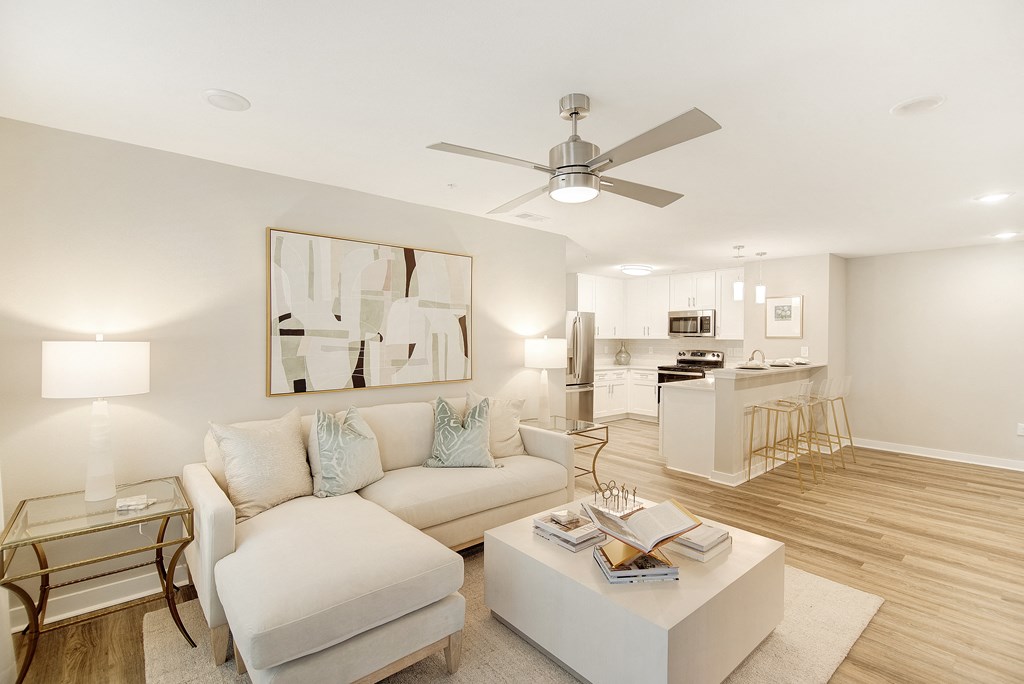 a living room with a couch and a coffee table at The Azul Apartment Homes in Oxford, MS