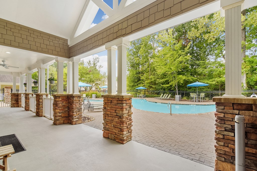 Covered lounge at the community pool at Highlands Apartment Homes, Bartlett