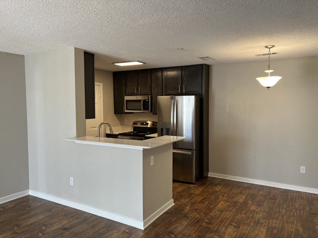 Open Kitchen and Dining Area at The Vineyard of Olive Branch Apartment Homes, Mississippi, 38654