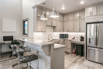 Grand Clubhouse Kitchen Grand Clubhouse Kitchen at Parkwest Apartment Homes, Hattiesburg, MS, 39402 - Photo Gallery 2
