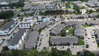 an aerial view of houses in a suburban neighborhood at Parkwest Apartment Homes, Hattiesburg, 39402