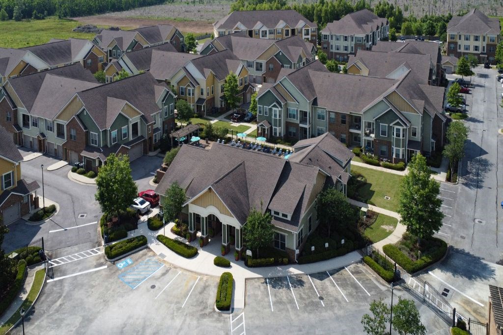 an aerial view of a large house in a neighborhood at Audubon Park Apartment Homes, Zachary, 70791
