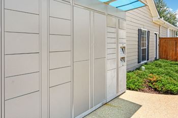 a row of garage doors in front of a house at Bridgewater Apartment Homes, Brandon, MS 39047