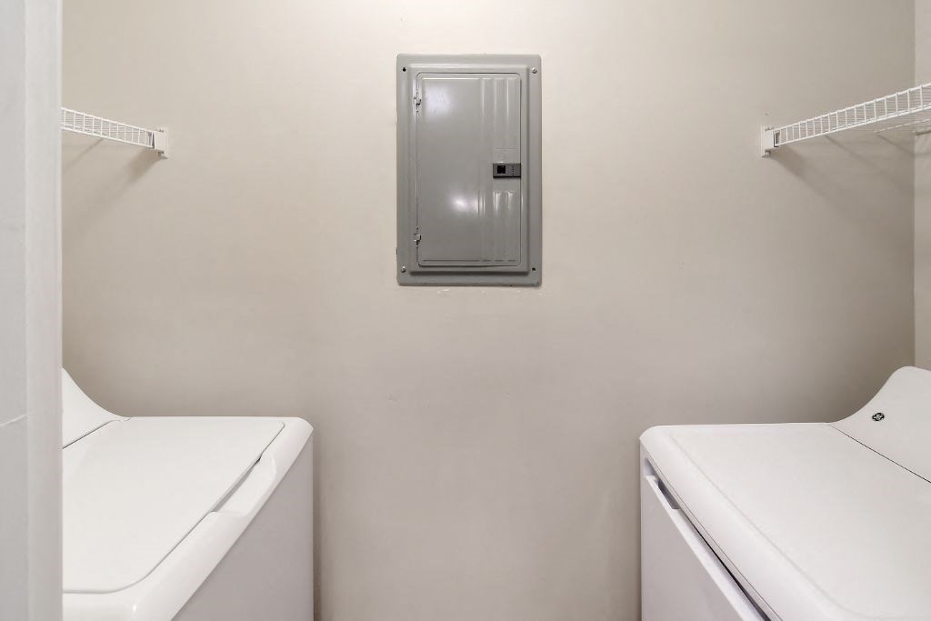 a washer and dryer in a laundry room  at Bridgewater Apartment Homes, Brandon, MS, 39047